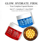 Three cosmetic capsules from YOU Skincare are arranged on a white background with promotional text at the top. The set includes a red jar labeled Radi-C, a blue jar labeled HydraBloom, and an open amber bowl filled with yellow gel capsules.