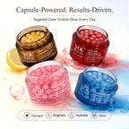 Four open cosmetic capsules from YOU Skincare arranged on a white background with decorative liquid splashes and a lemon slice. The jars are labeled Radiant-Cera Cream, Rose-Folin Cream, Glow-Corpse Cream, and HydraBloom Cream, with text above reading 'Capsule-Powered.