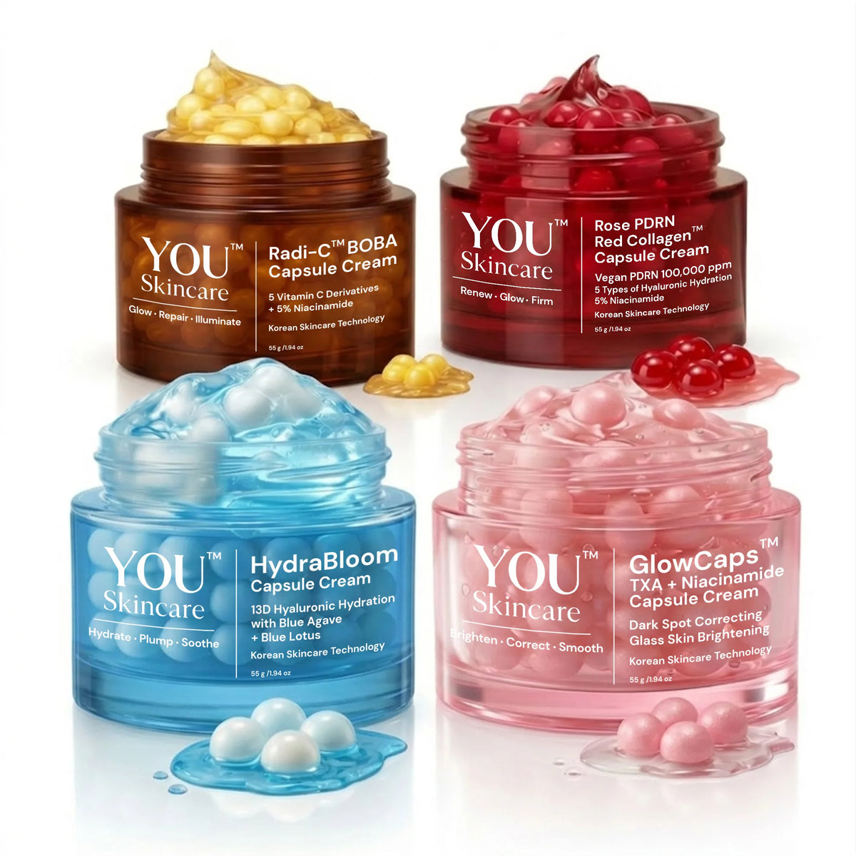 Four jars of YOU Skincare cream with different colored lids on a white background